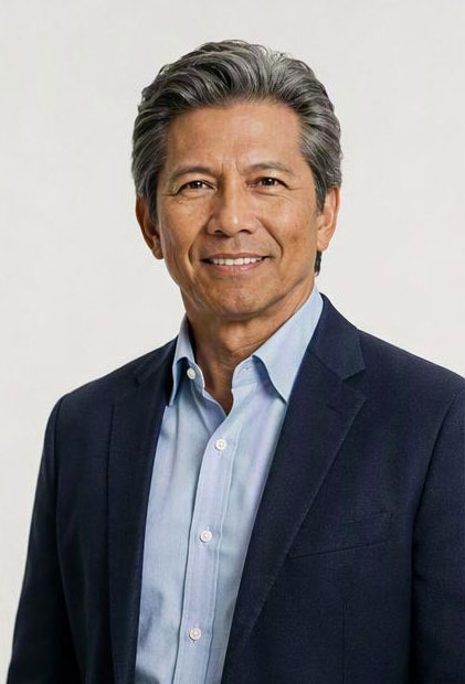 A smiling provider in his workshop studio